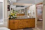 Luxury awaits with dual vanities, soaking tub, and walk in shower